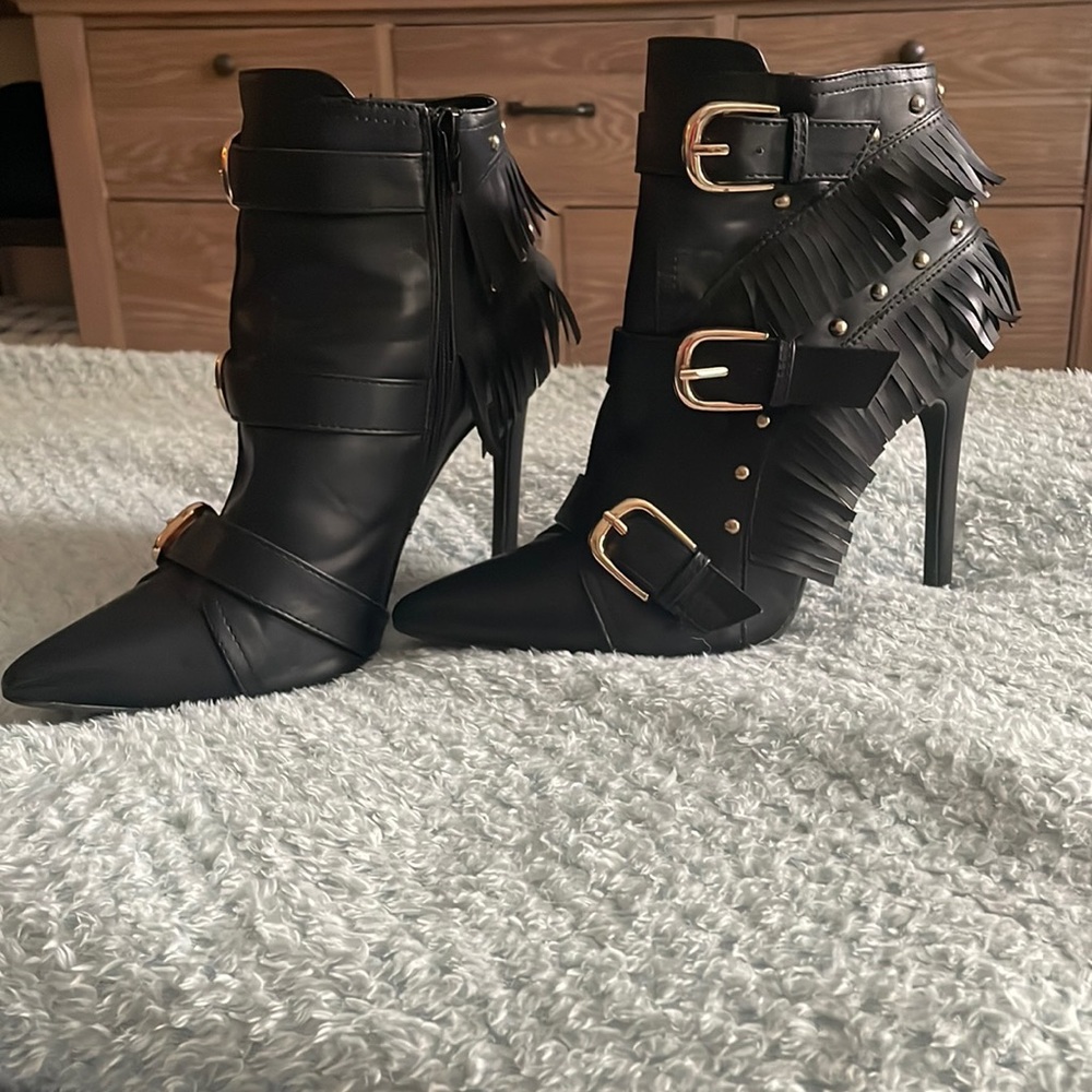 Black fringe heels